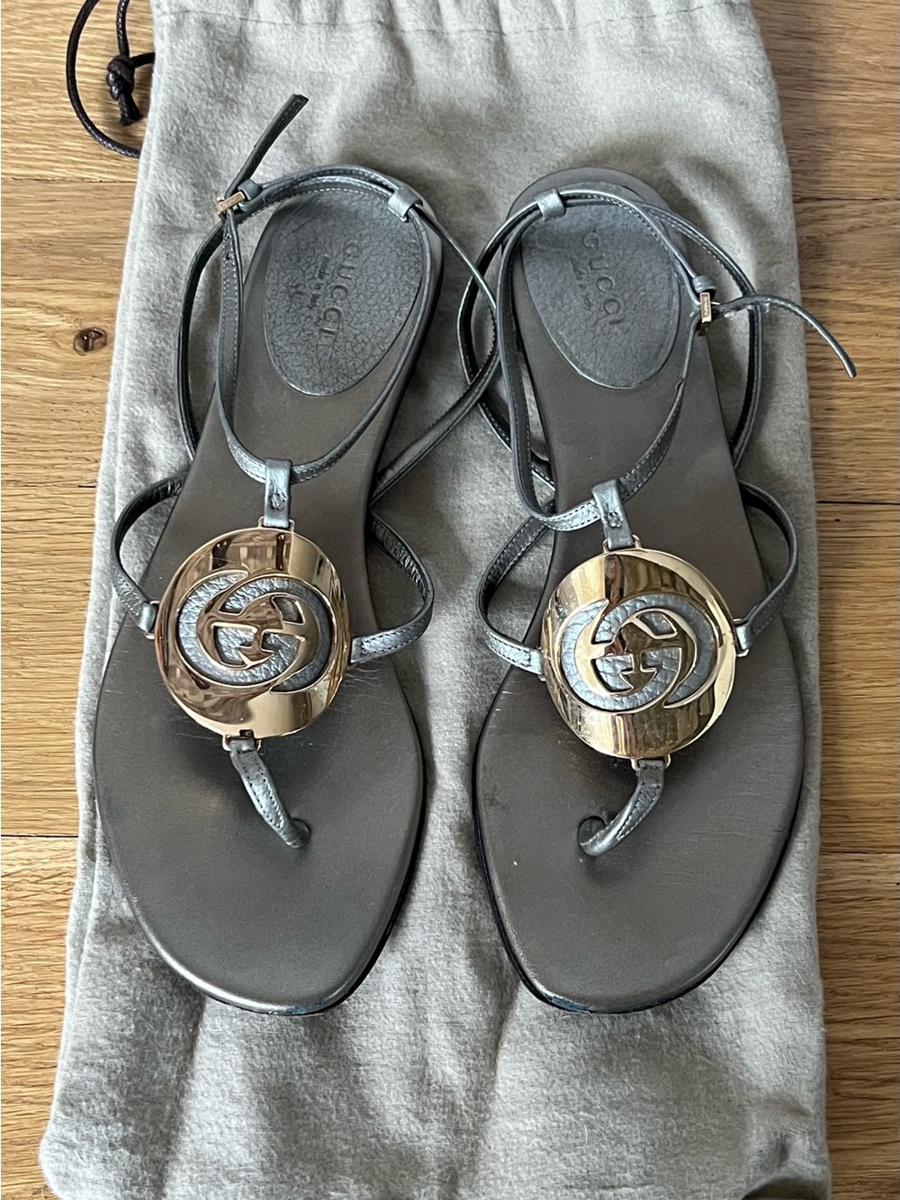 Gucci Metallic Gray Thong Sandals with Gold GG Medallions